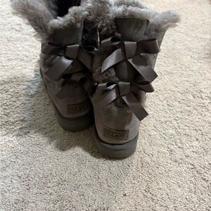 UGG Women's Bailey Bow Short Boots in Taupe Suede